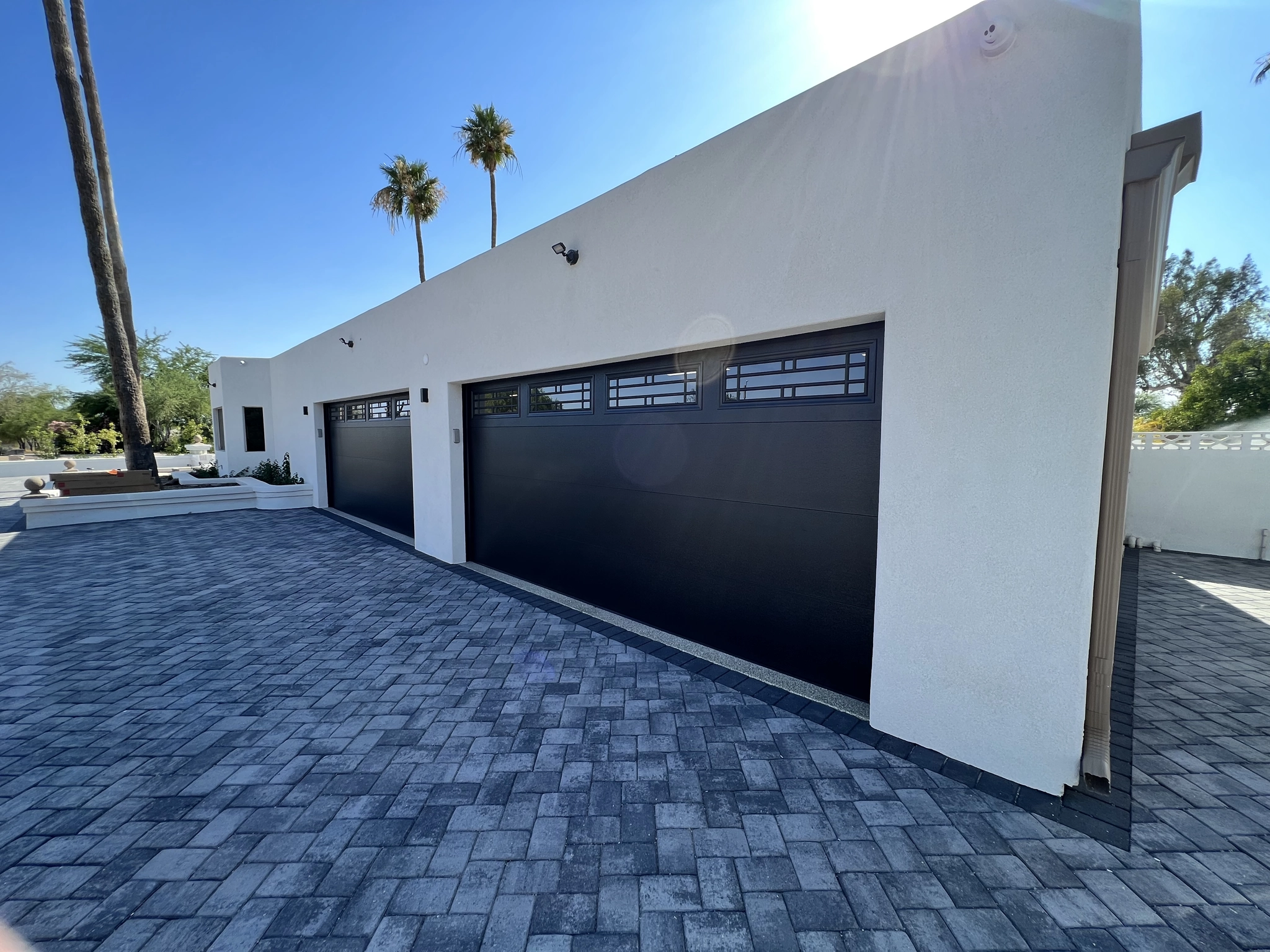 Black Flush Panel Garage Door With Long Pane Glass And Decorative Inserts Black Flush Panel Garage Door With Long Pane Glass And Decorative Inserts