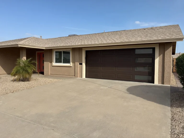 Chocolate Brown Long Panel Garage Door With Stacked Glass