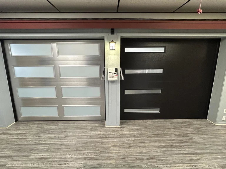 Double Stacked Glass Garage Door With Frosted Windows And A Black Flush Panel Garage Door With Slimline Stacked Frosted Glass