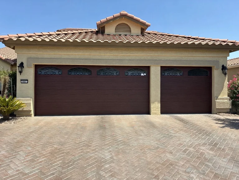 Mahogany Wood Grain Garage Door With Decorative Arched Glass