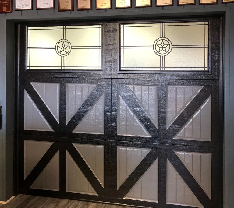 Two Tone Grey And Black Carriage Style Garage Door With Decorative Glass