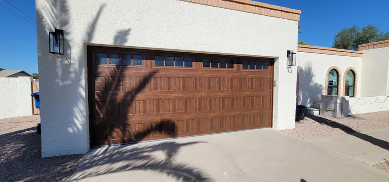 Walnut Recessed Garage Door With Long Panel Glass And Decorative Inserts