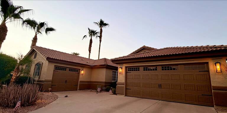 Brown Short Panel Bead Board Garage Door With Windows And Decorative Trim